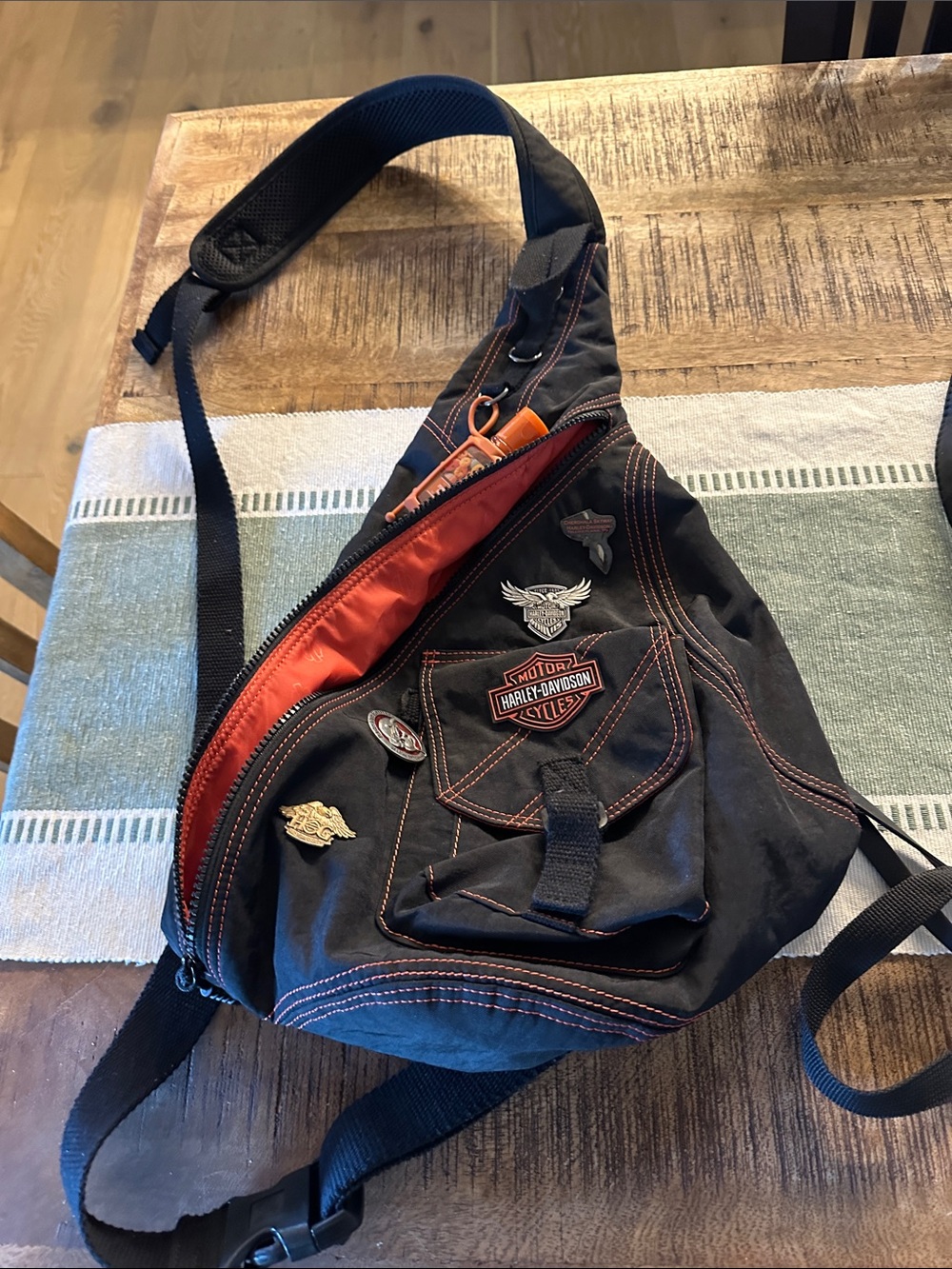 Harley-Davidson Black Sling Bag with Orange Lining and Accent Stitching